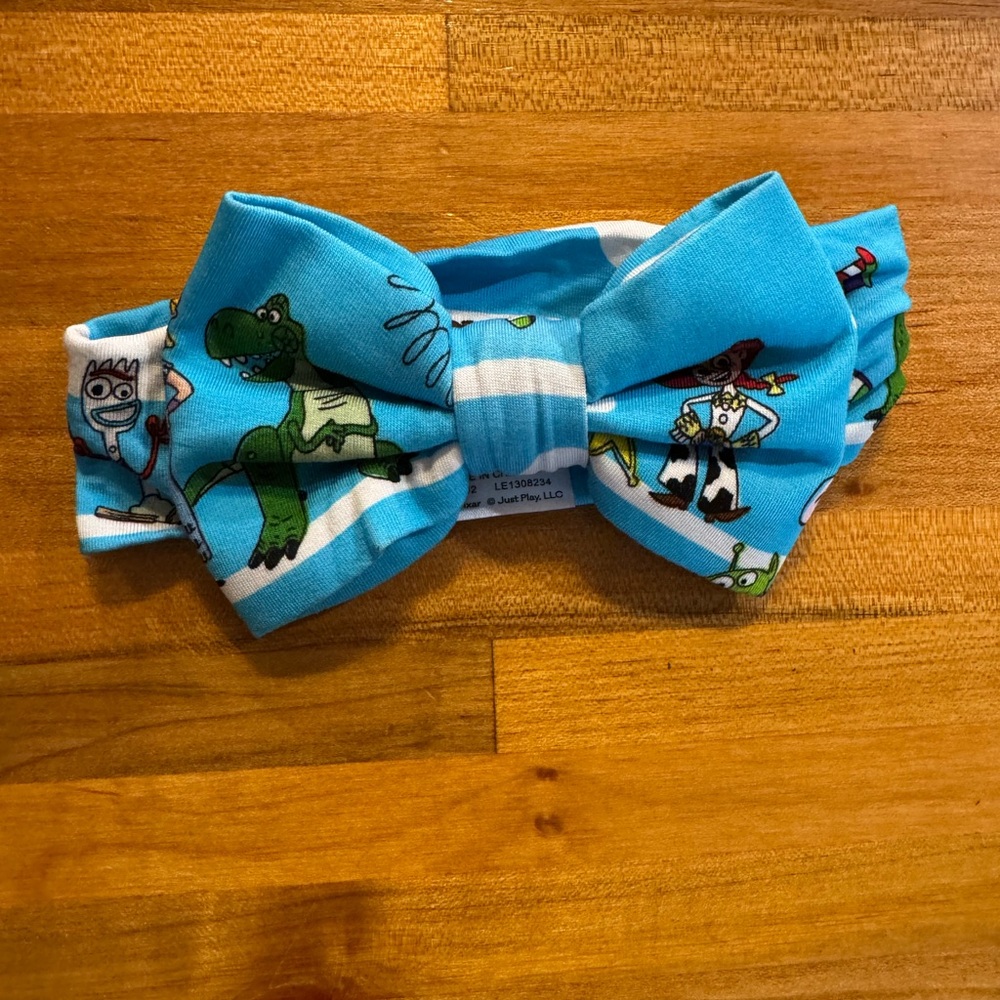 Little Sleepies Limited Edition Toy Story Lux headband bow.